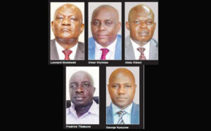 Suspended EC officials (left-right) Leonard Mulekwah, Umar Kiyimba, Abdul Kibesi, Frederick Tibakuno and George Kyeyune